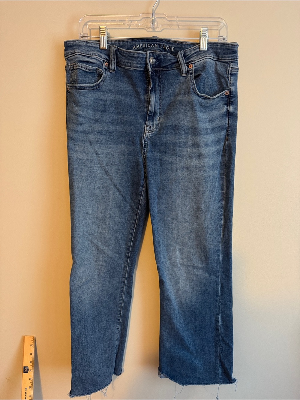 American Eagle next level stretch jeans 12 frayed bottoms